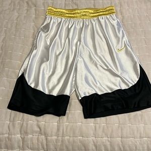 Nike Dri-Fit basketball shorts.